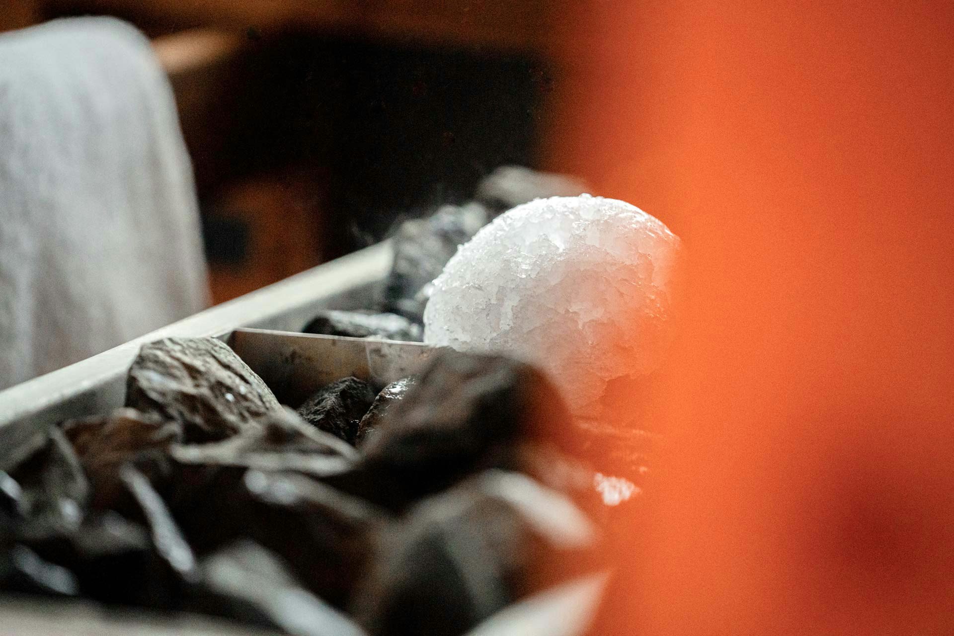 Ice ball on glowing coals