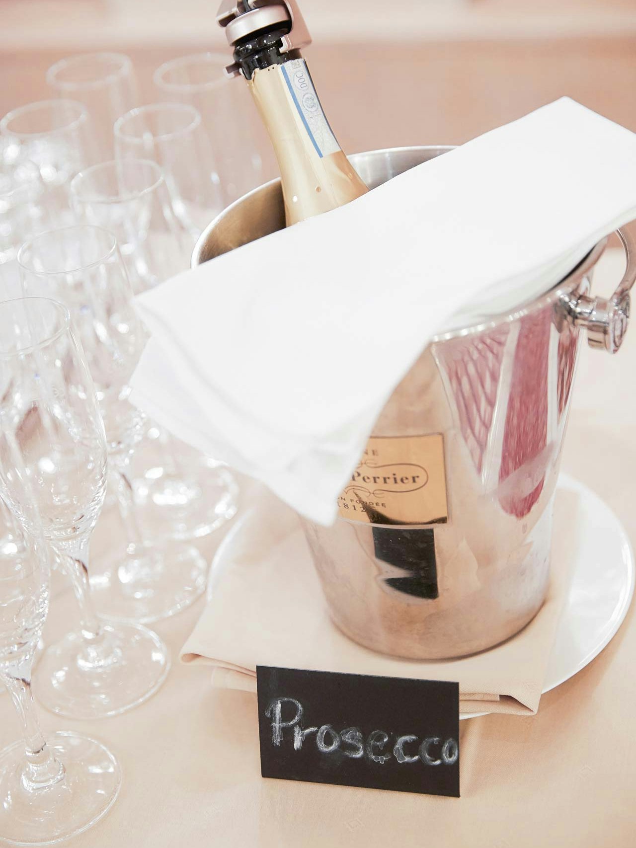 BEATUS Culinary Breakfast Buffet Breakfast buffet with Prosecco bottle in cooler and cloth napkin, glasses next to it