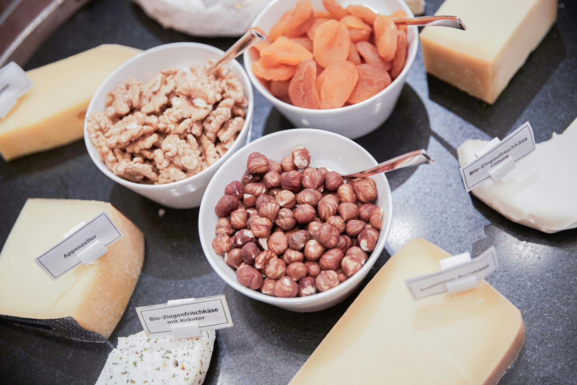 Breakfast buffet with nuts, dried fruit and cheese