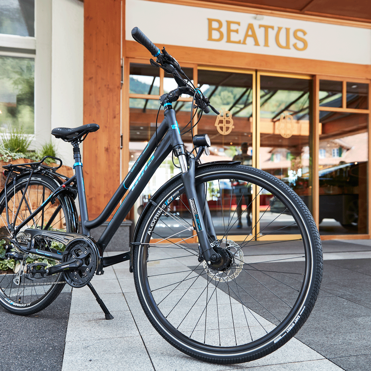 Beatus Bike Mountain bike in front of the Hotel Beatus entrance