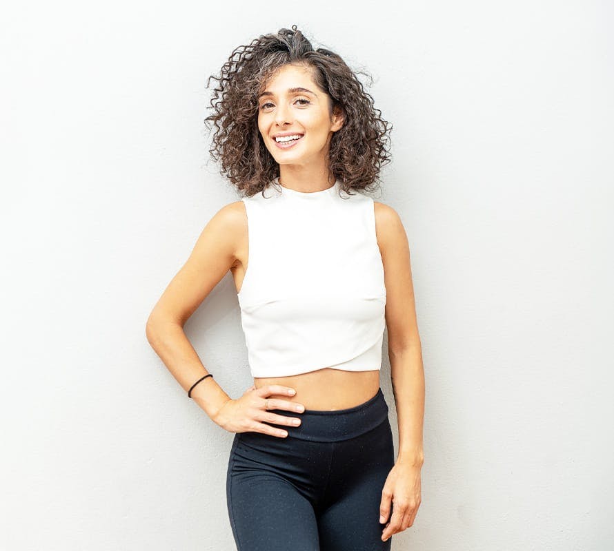 woman posing in athletic gear