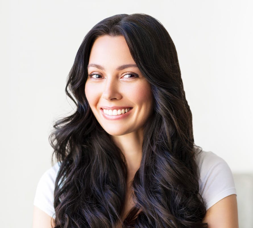black-haired woman smiling