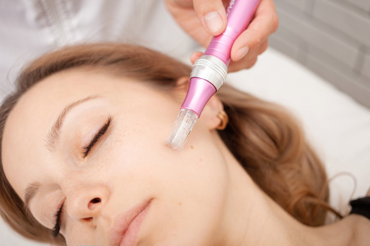 woman eyes closed getting facial