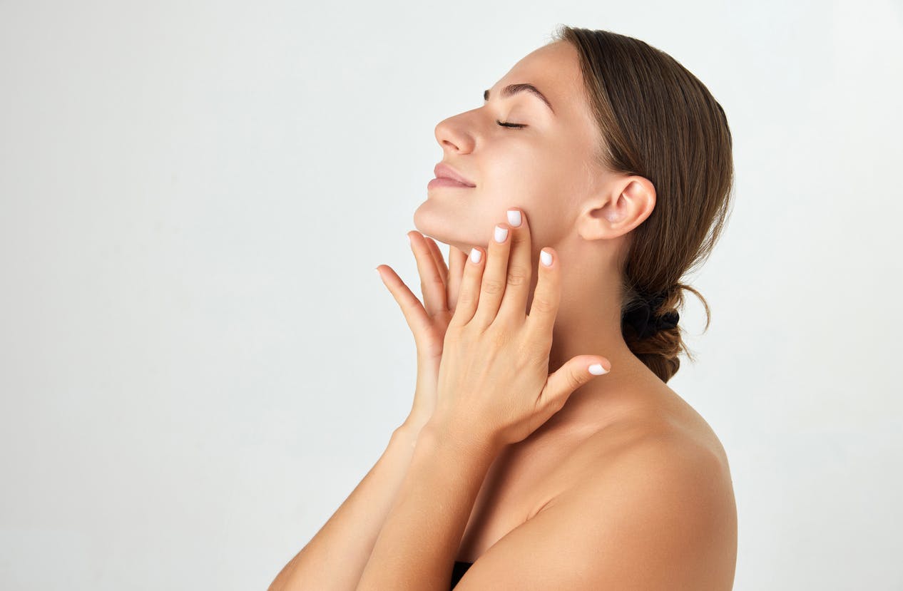 woman touching face