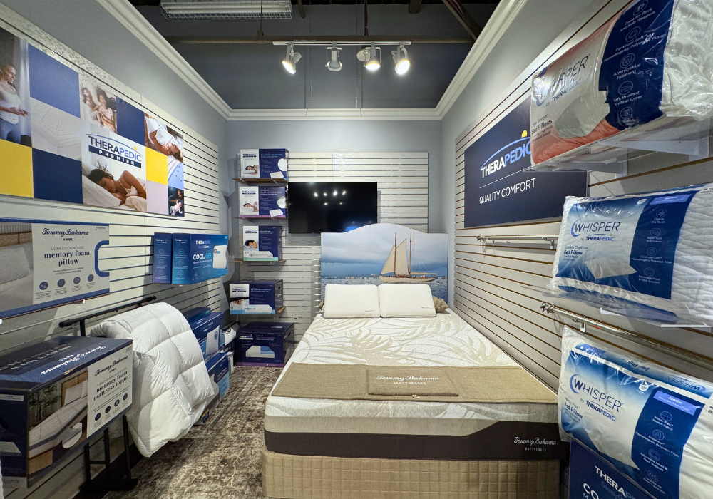 Area of Therapedic's showroom with bedding accessory products