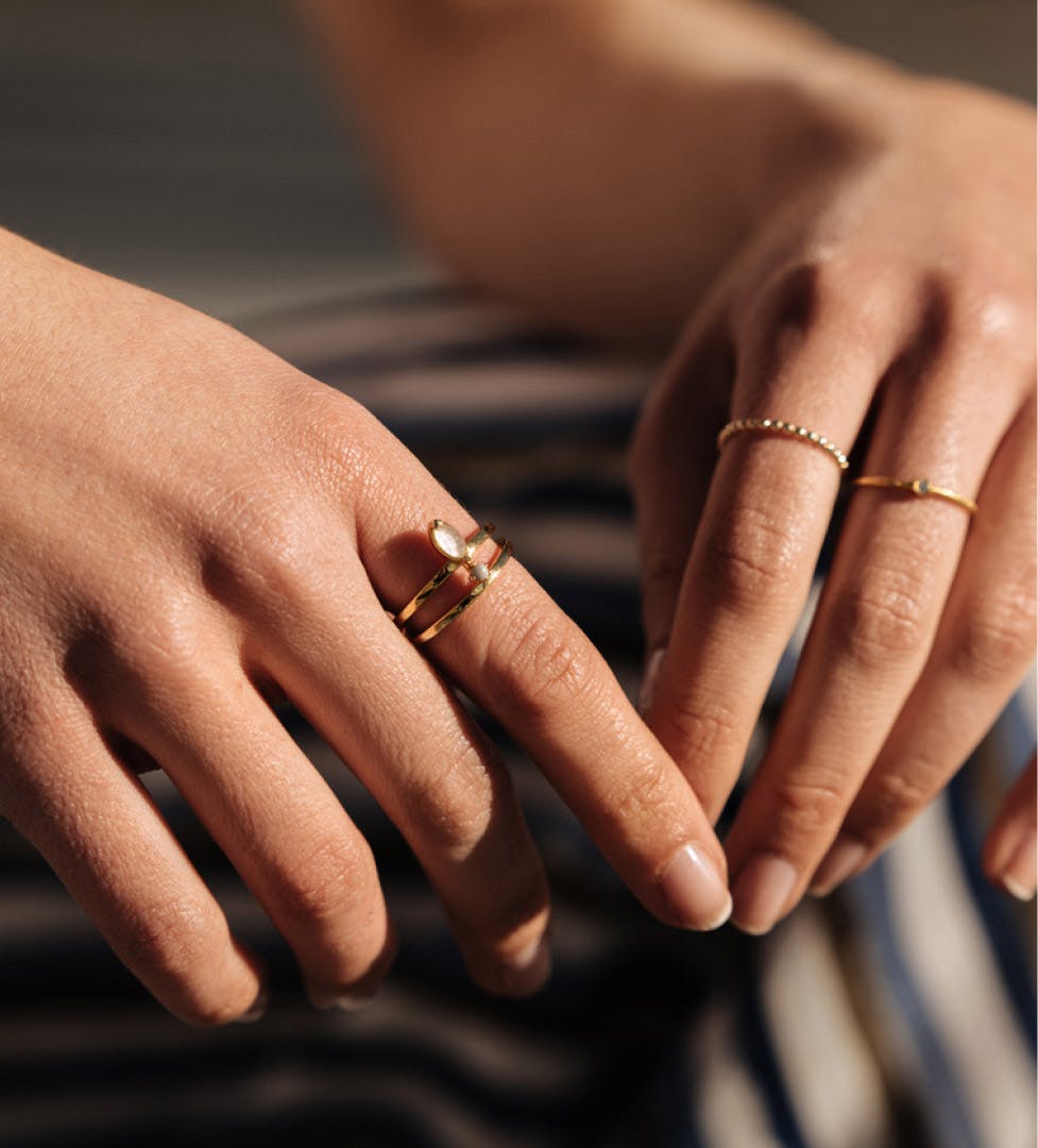 hands with gold rings