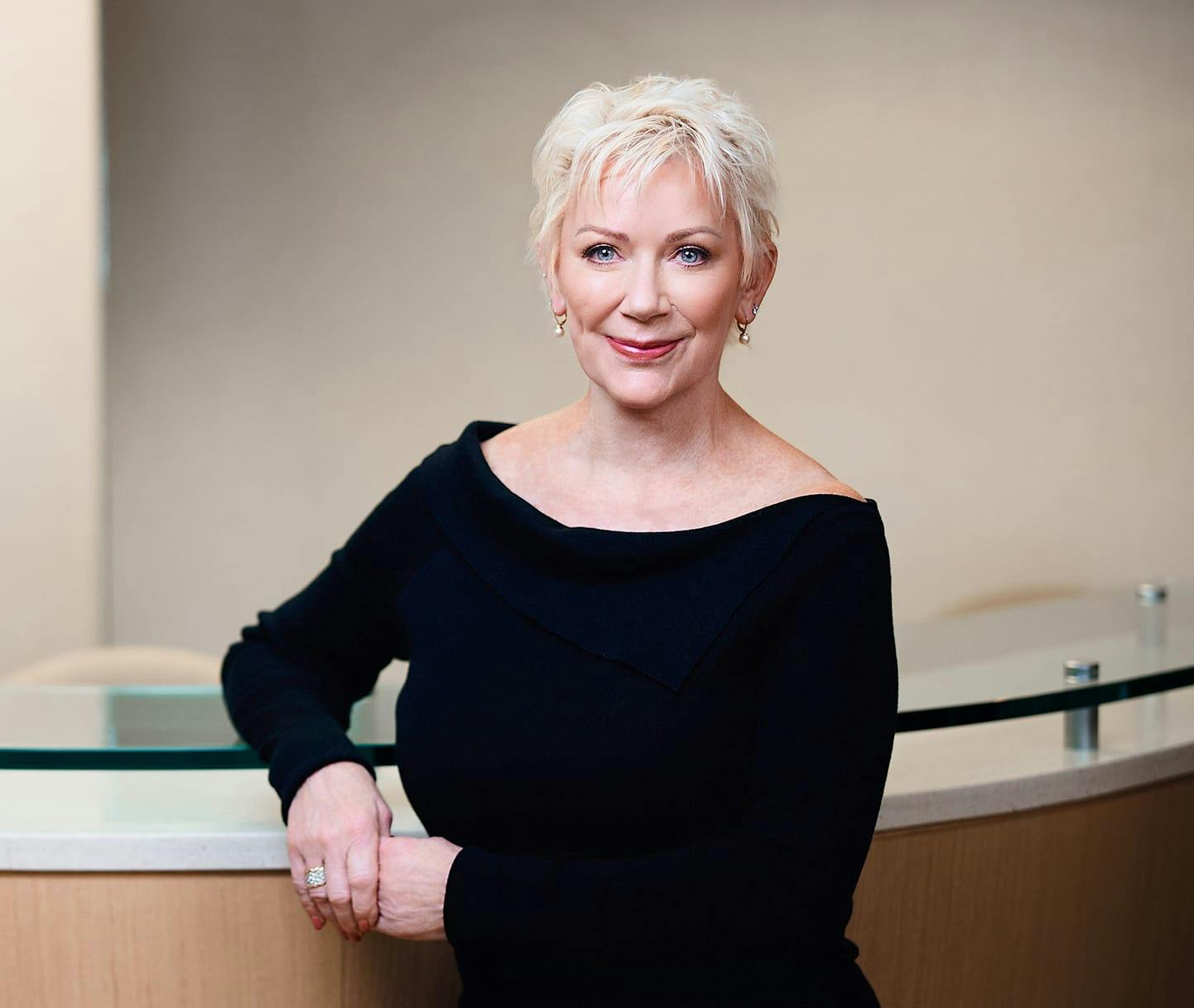 Woman smiling at the front desk