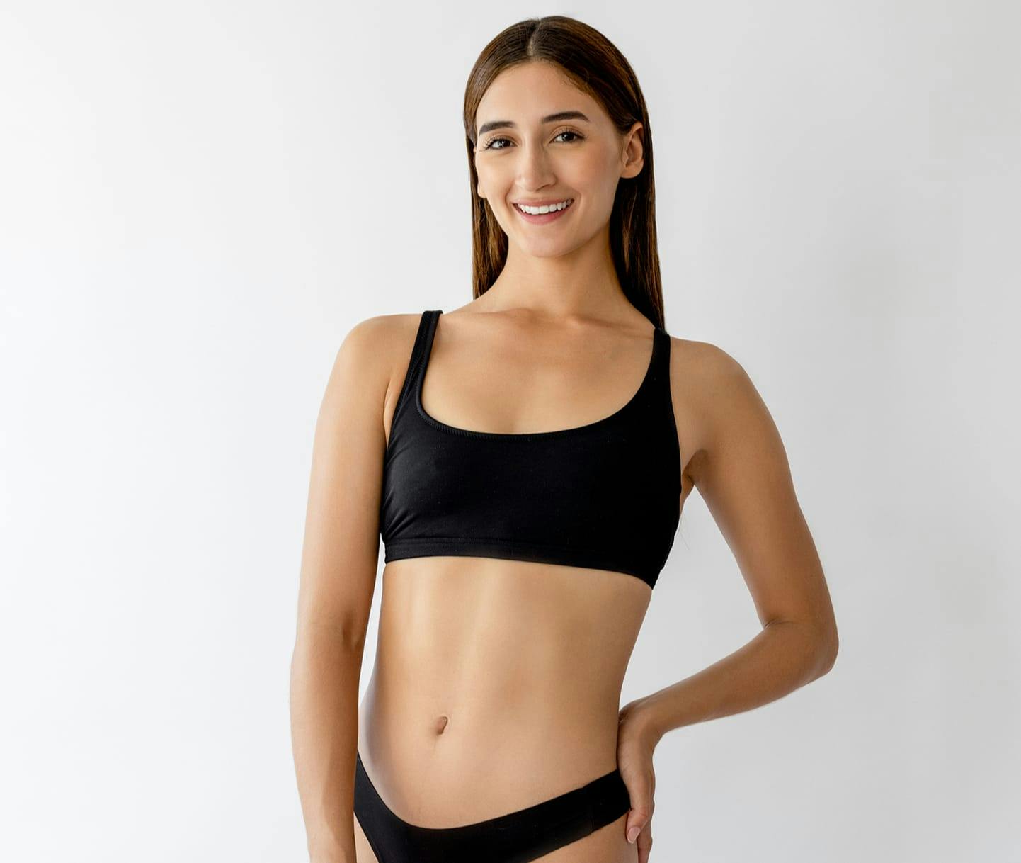 woman in a black sports bra