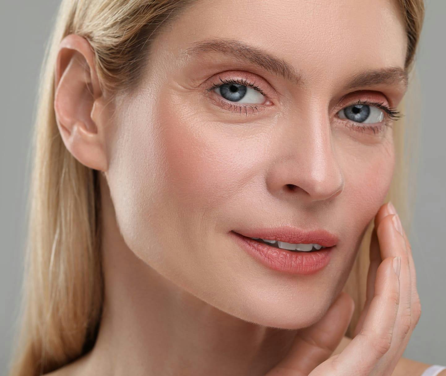 woman with blonde hair and blue eyes