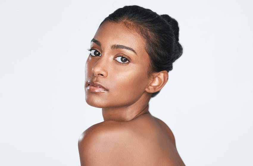 woman looking over her shoulder