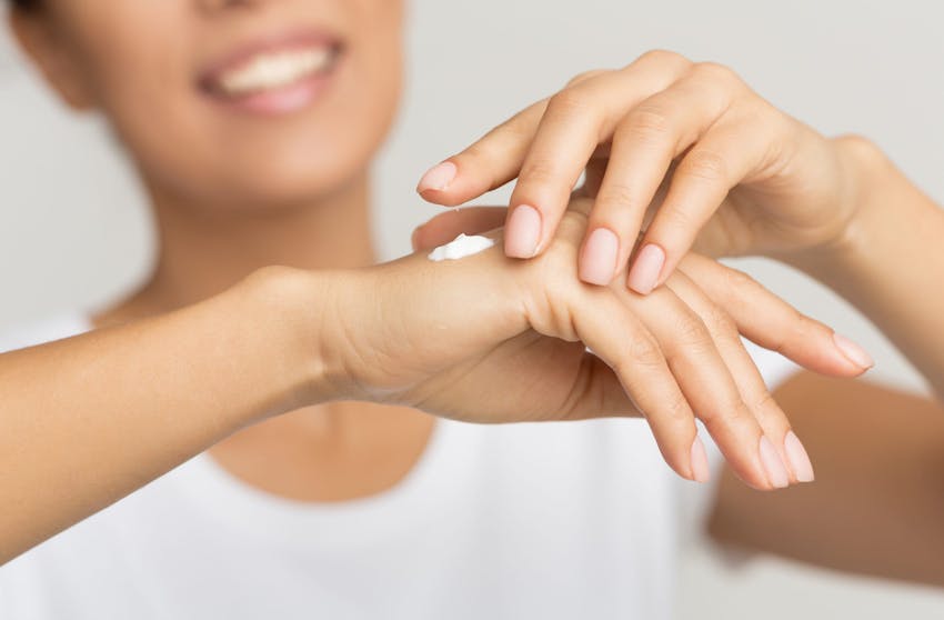 Woman touching hands together