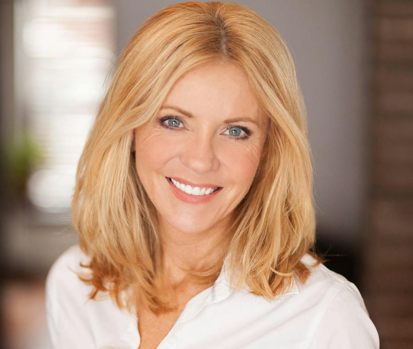 woman with blonde hair smiling