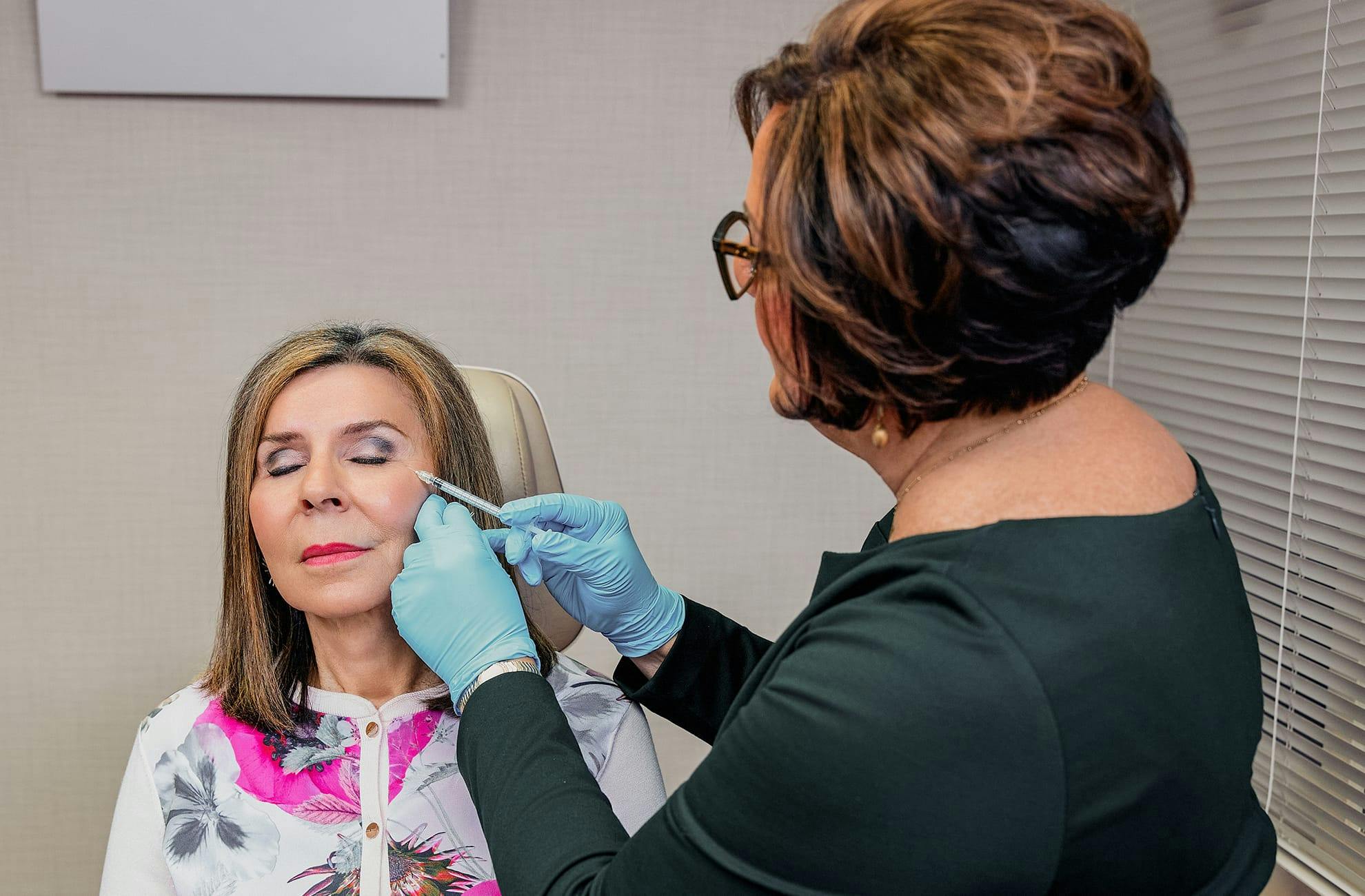woman getting an injectable treatment