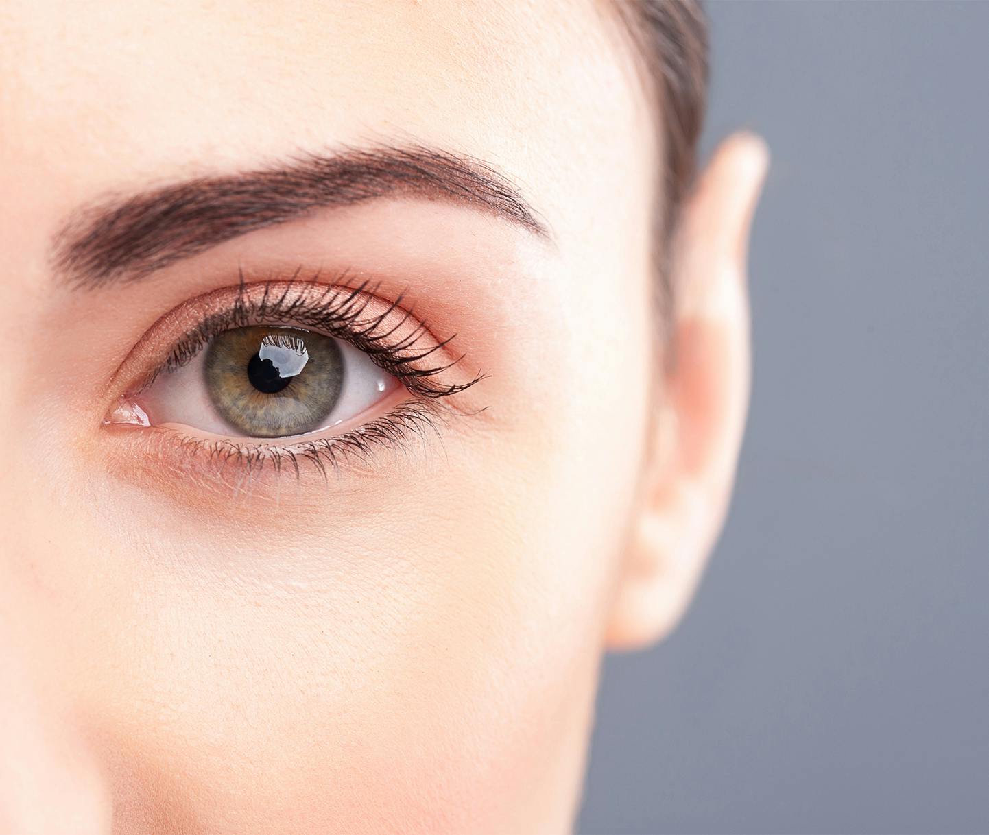 woman smiling with long wavy hair