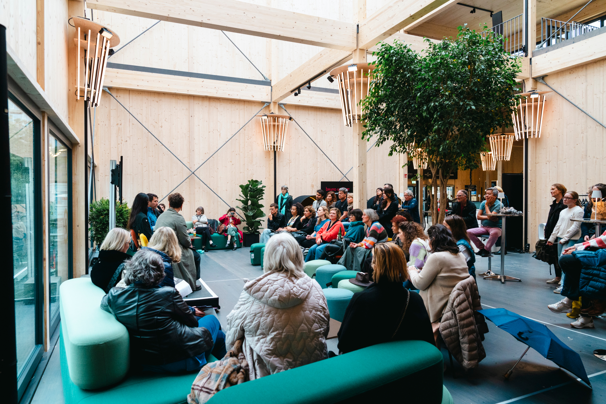 Group of guests visiting a ZFF talk at the festival centre.