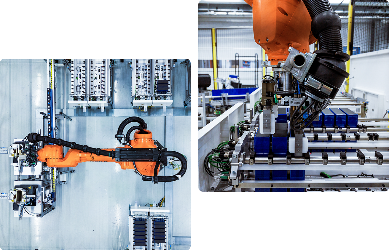 Industrial robotic arms operating in a manufacturing environment.