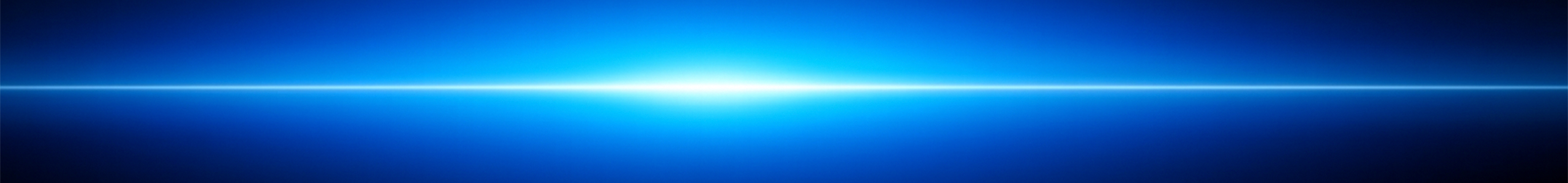 Abstract blue light streak on dark background.