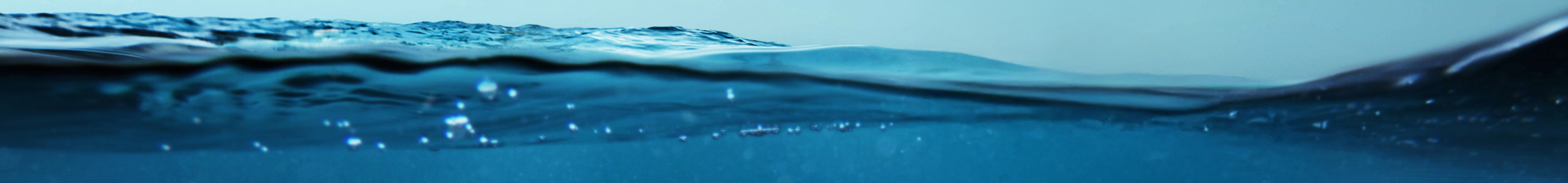 Close-up of calm water surface symbolizing purity and sustainability