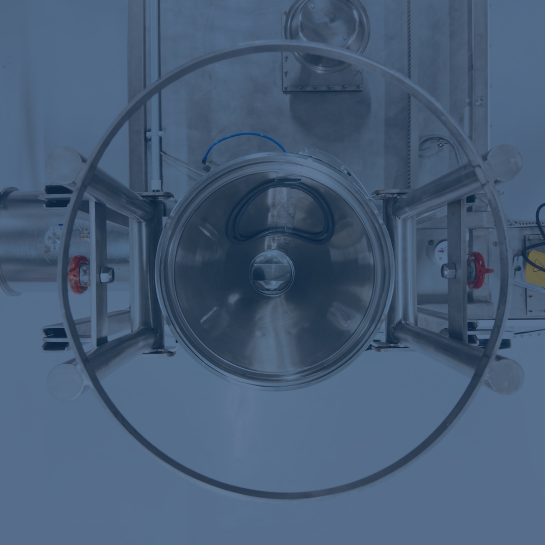 Front view of industrial testing chamber with circular door.