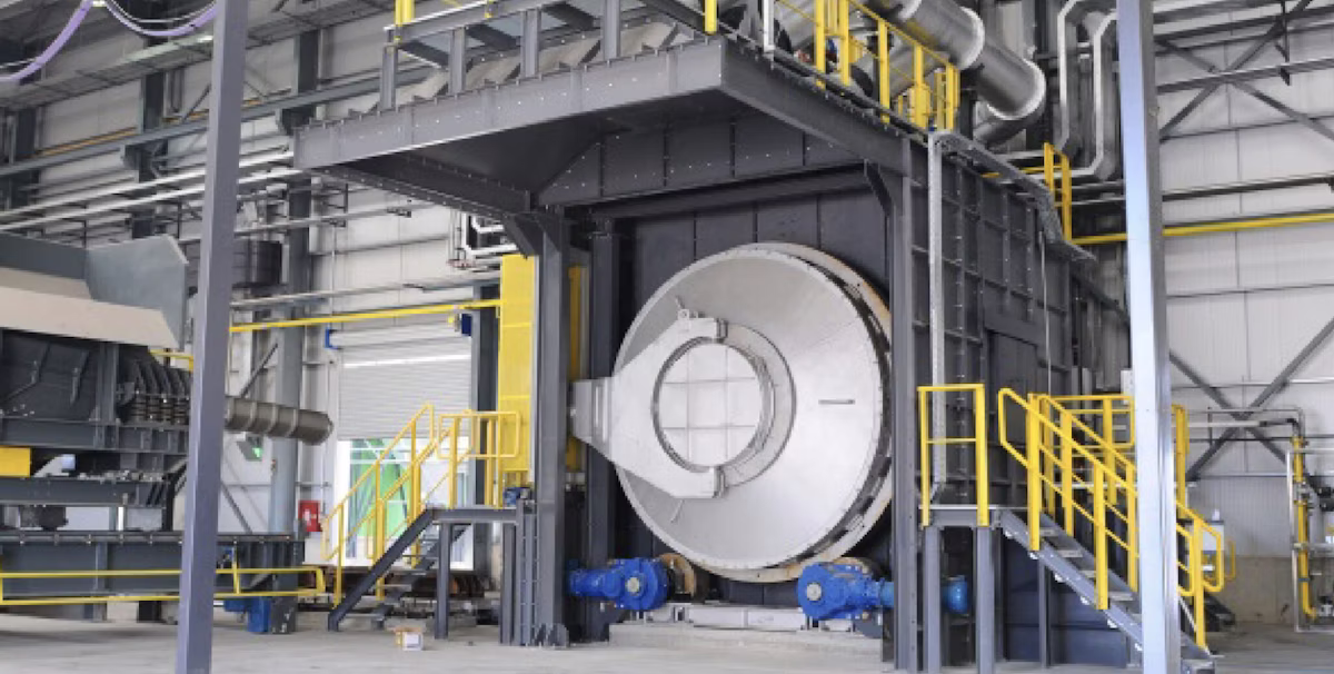 Large industrial processing chamber in a factory.