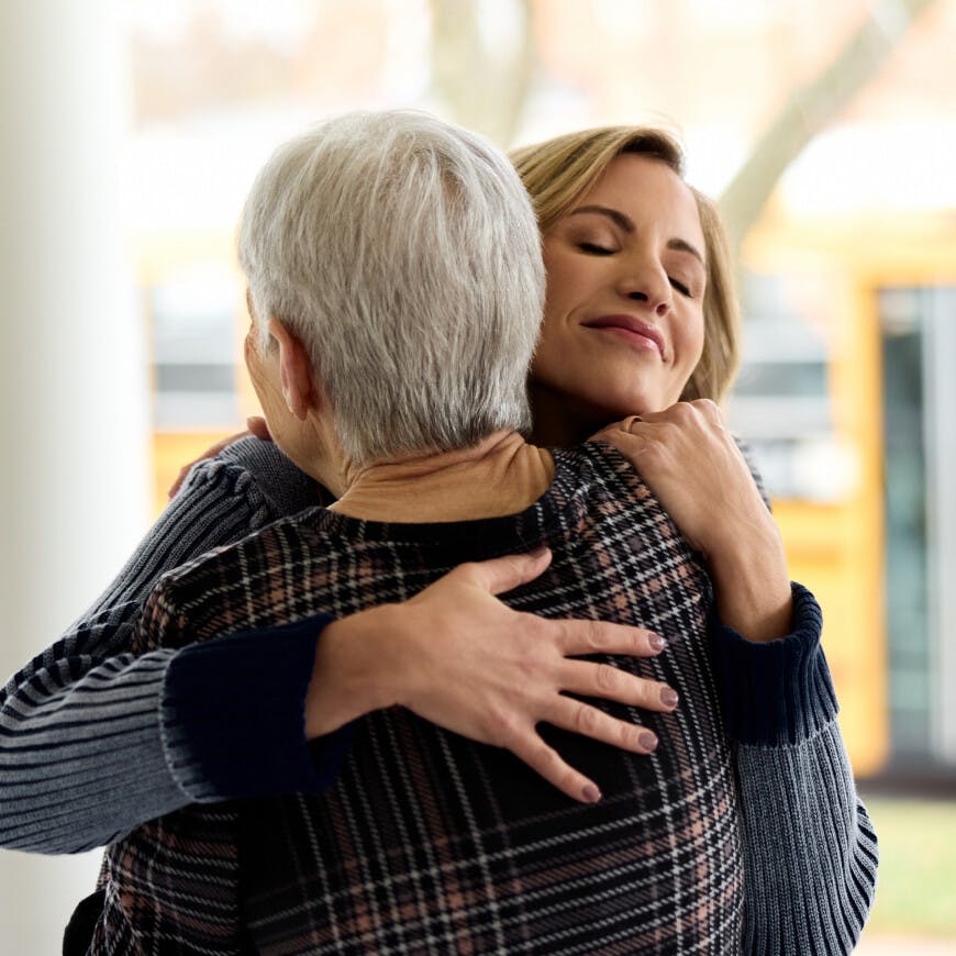 Sara Nichols hugging Luana