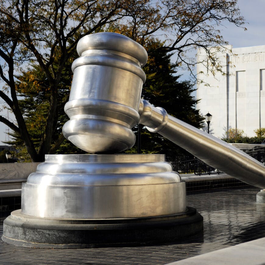 A statue of a gavel