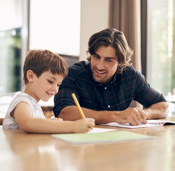 man helping child with homework