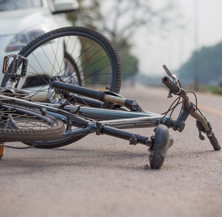 bicycle laying on the ground