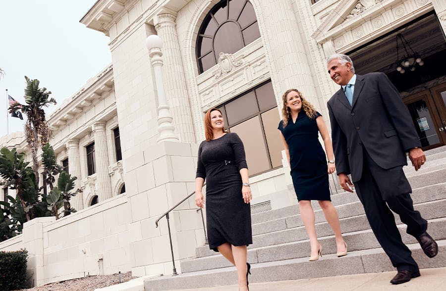 attorneys walking down stairs