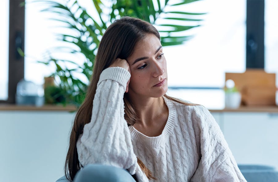 woman leaning on her hand