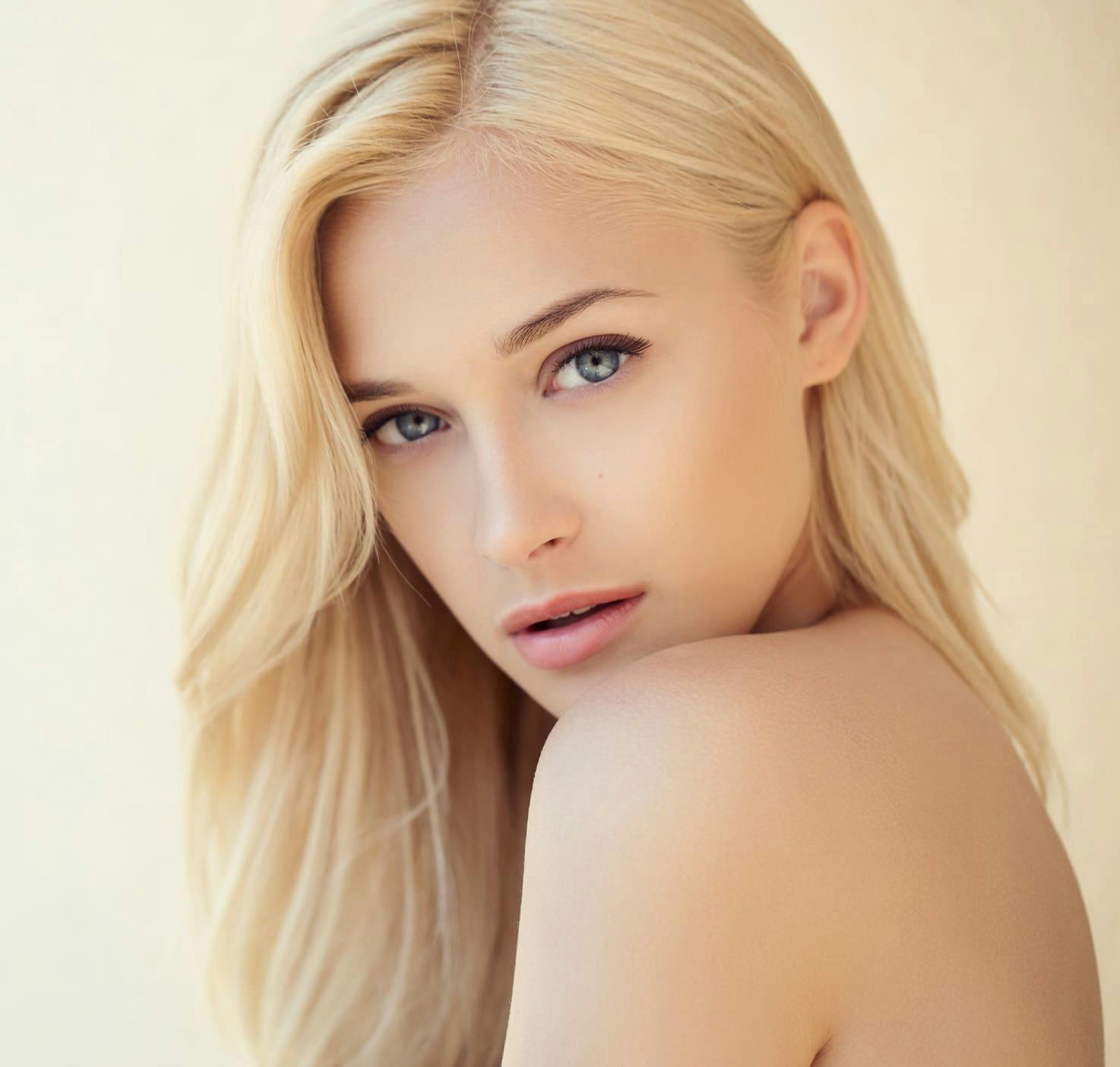 Blonde woman looking over shoulder