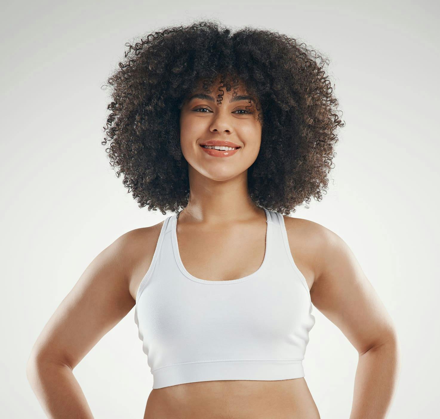 Woman with curly hair smiling