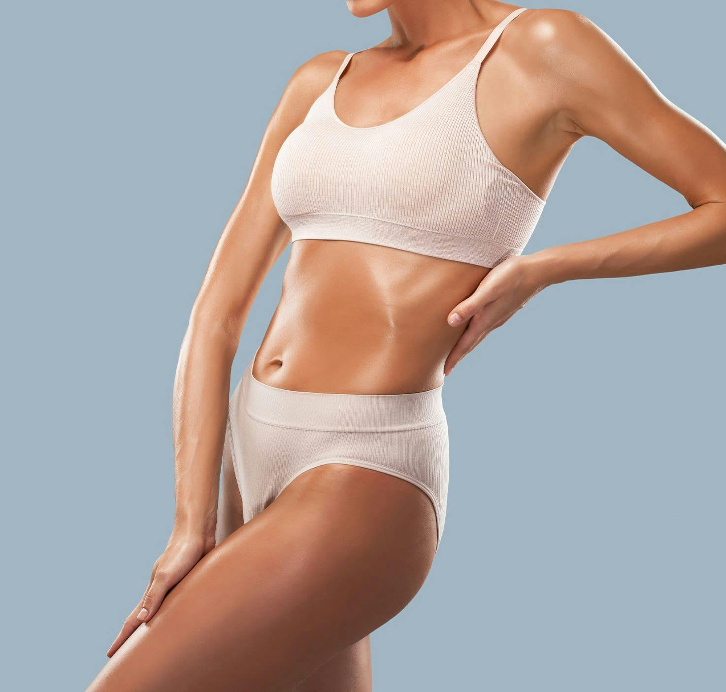 Woman with shiny skin posing