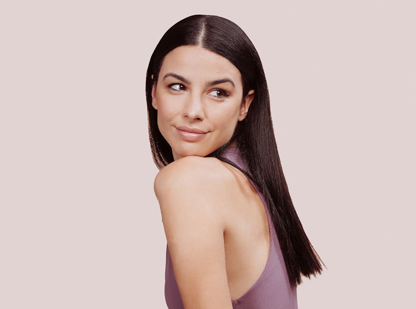 Woman looking over shoulder