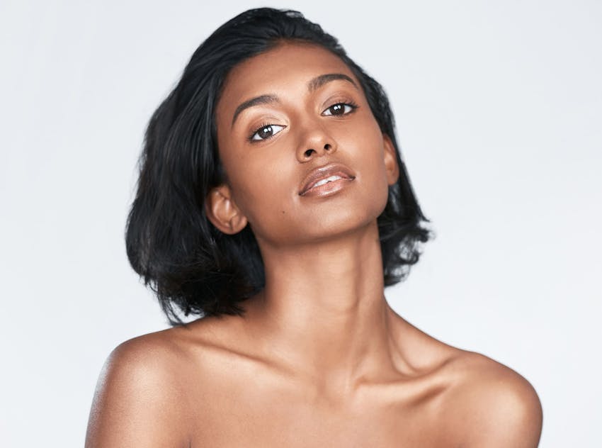 Woman leaning head back