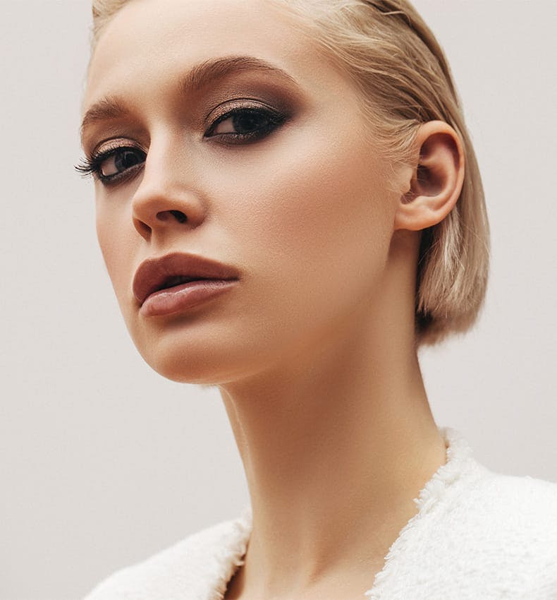 Blonde woman with shorter hair