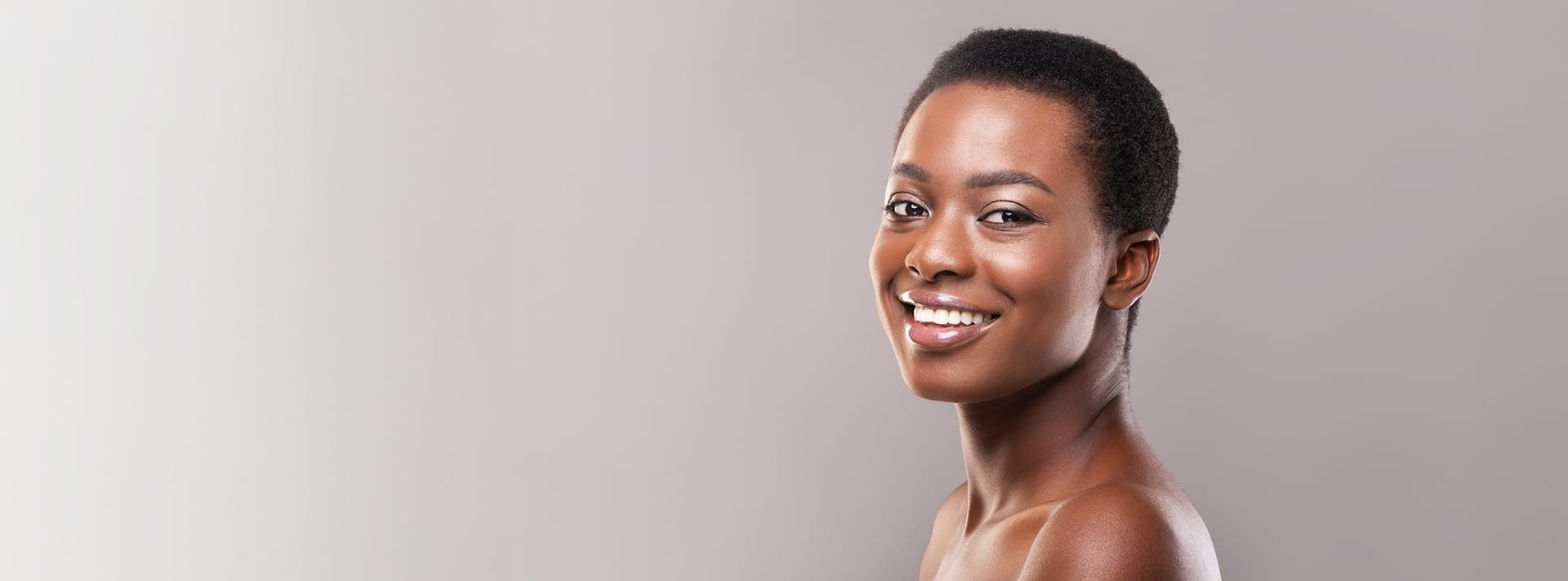 Woman with short hair smiling