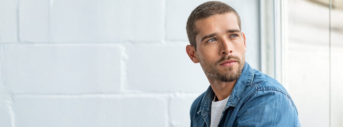 man looking over his shoulder