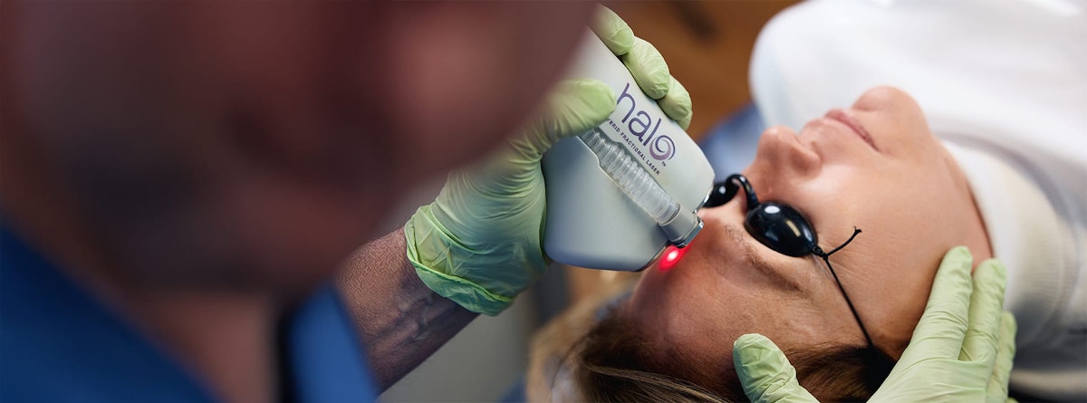 woman receiving laser treatment