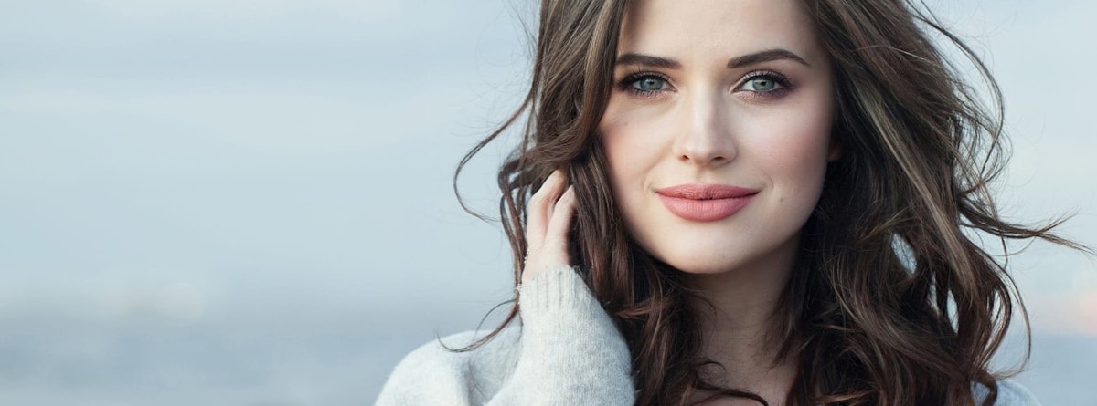 woman touching her hair