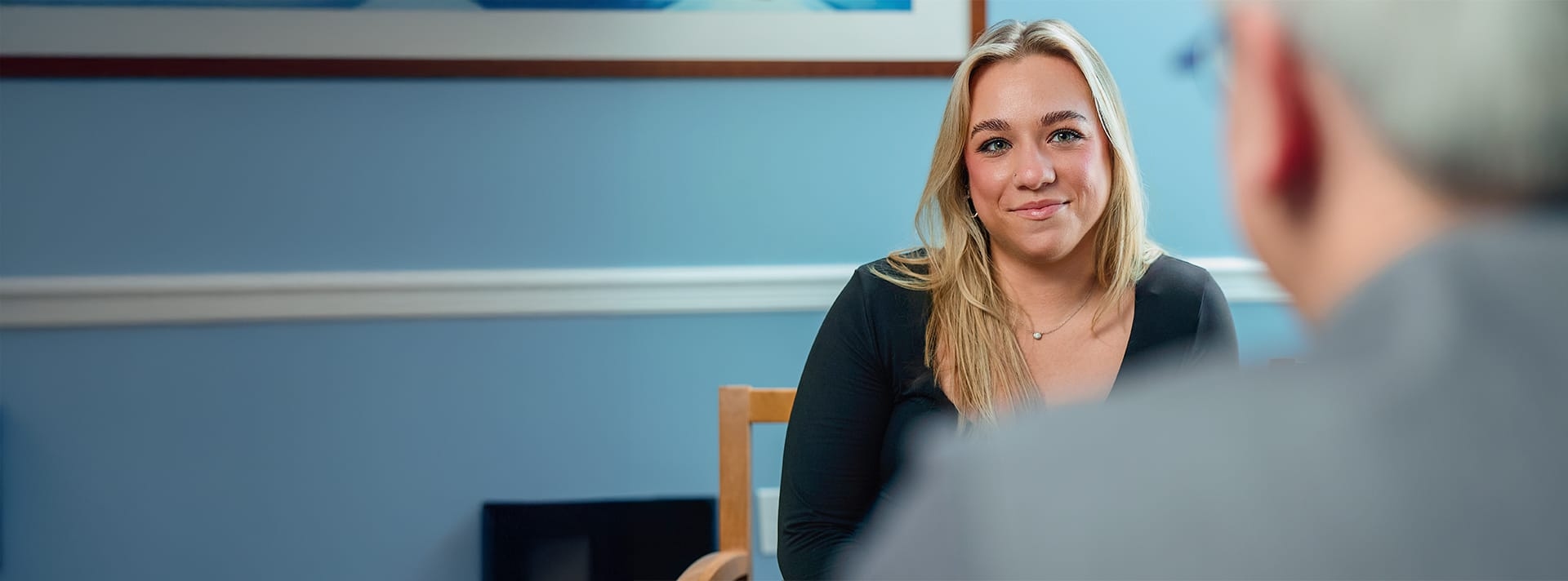 woman speaking to the doctor
