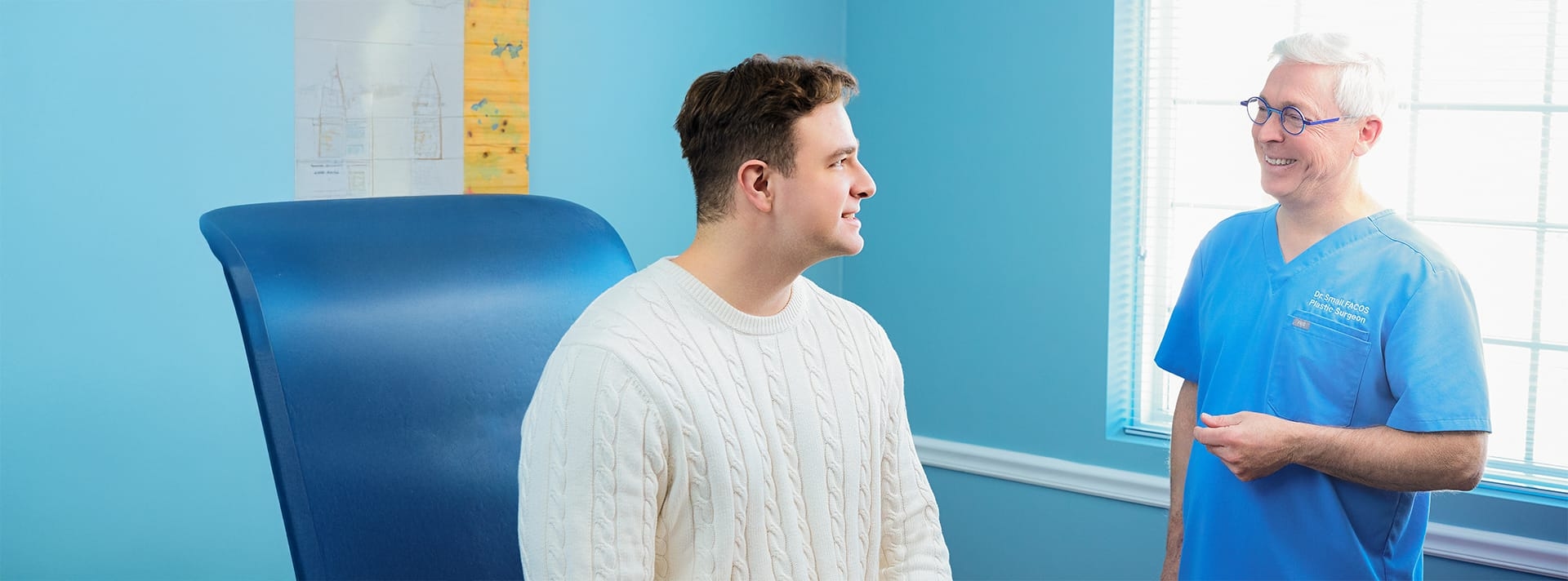 man smiling at doctor