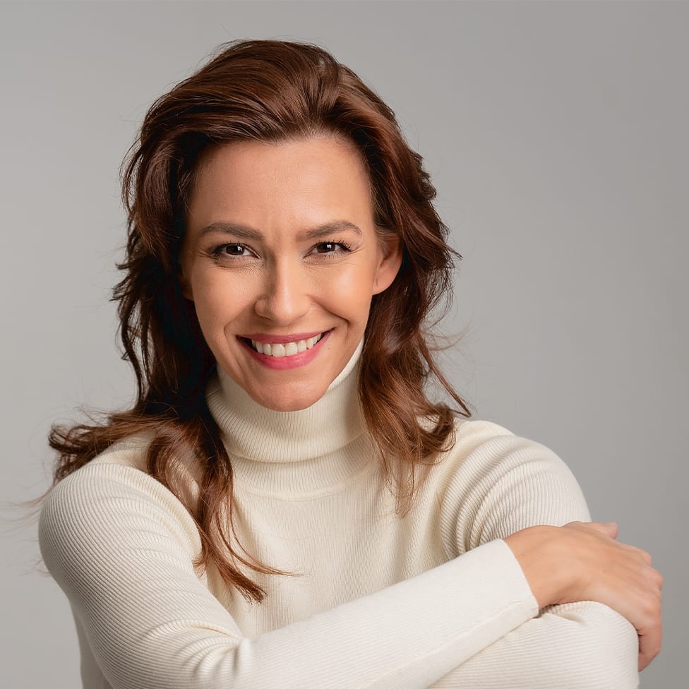 Woman with brown hair smiling