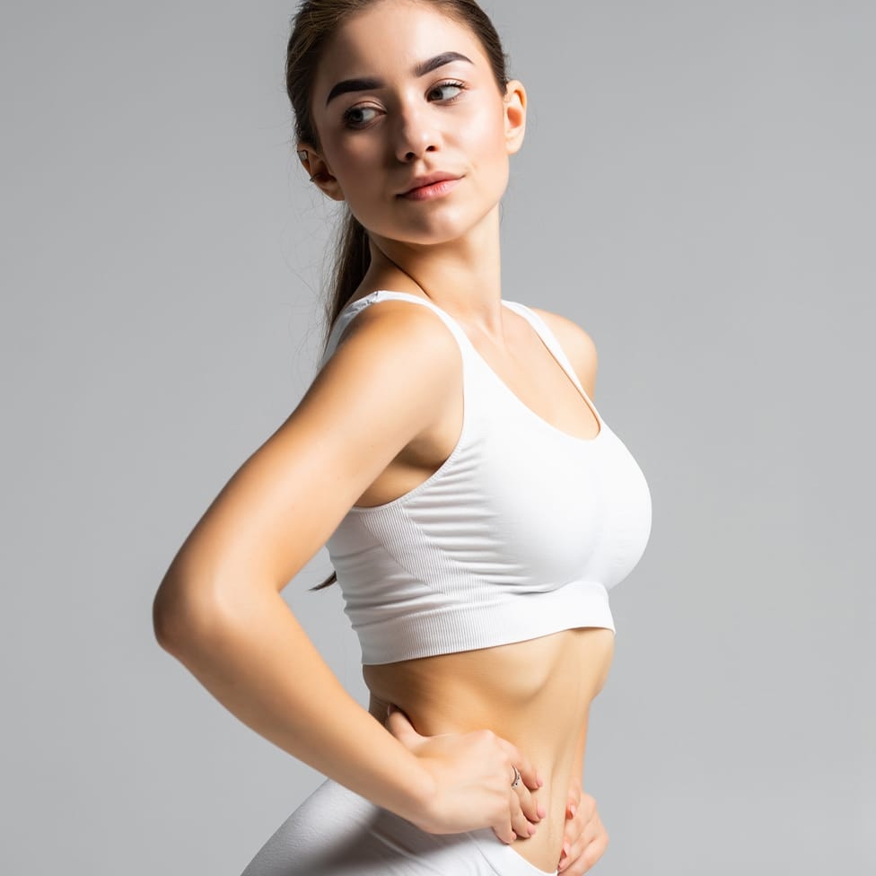 woman posing with her hands on her hips