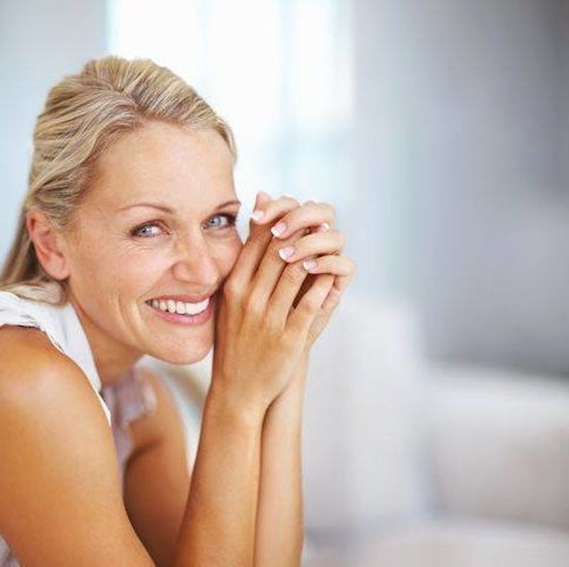 woman with blonde hair smiling