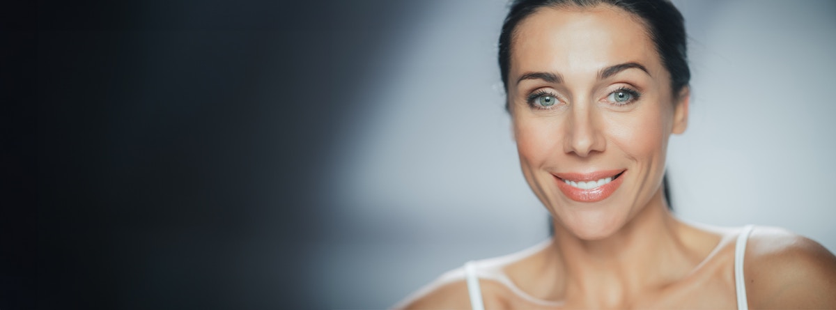 woman smiling forward