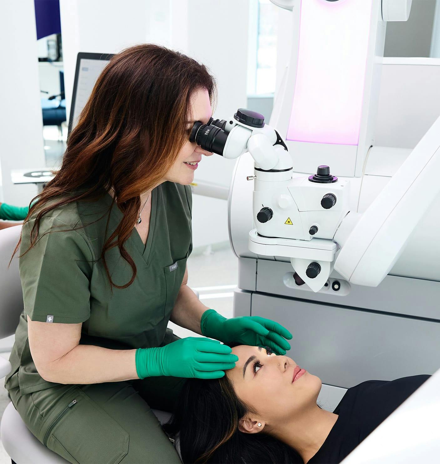 patient getting her eyes examined