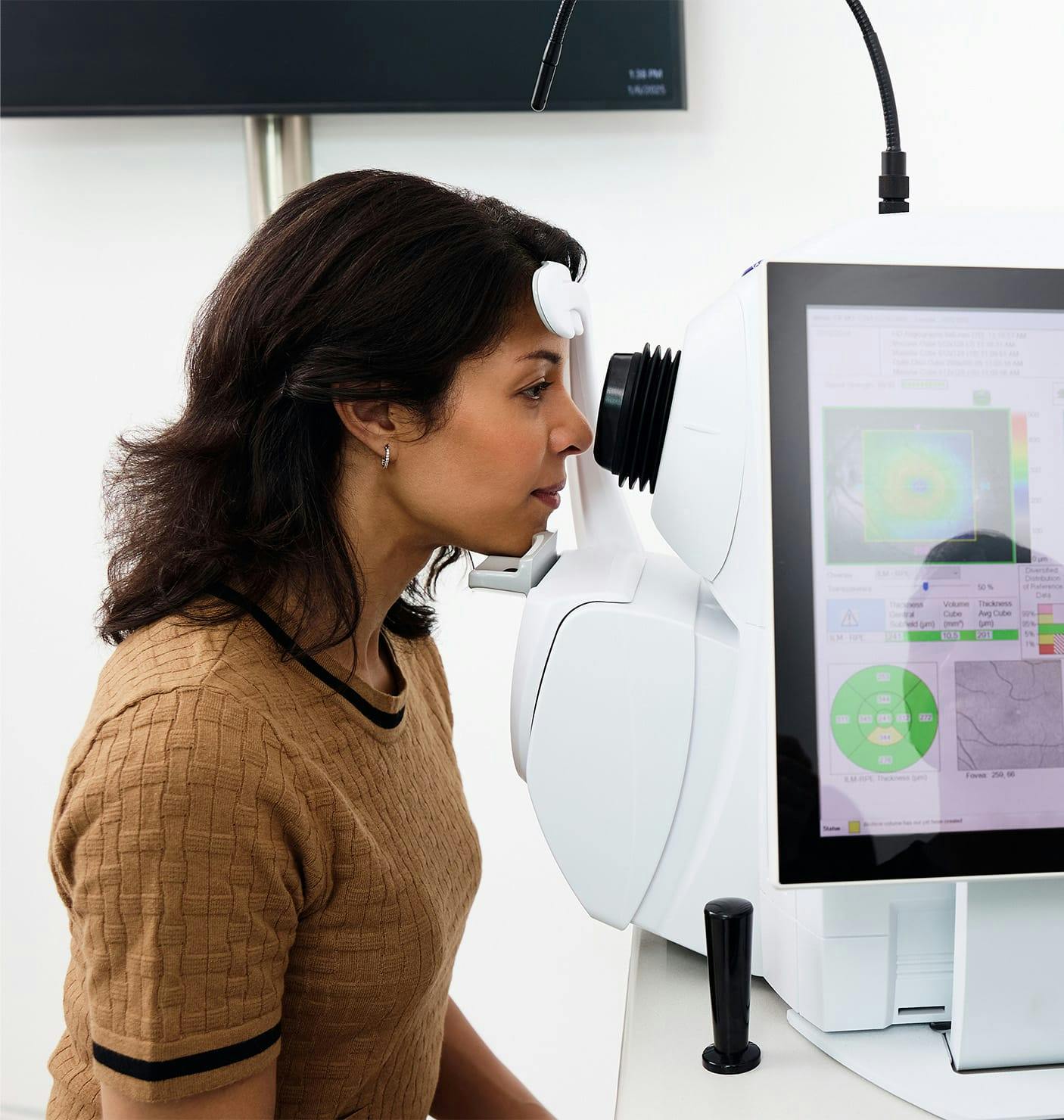 woman getting her eyes examined