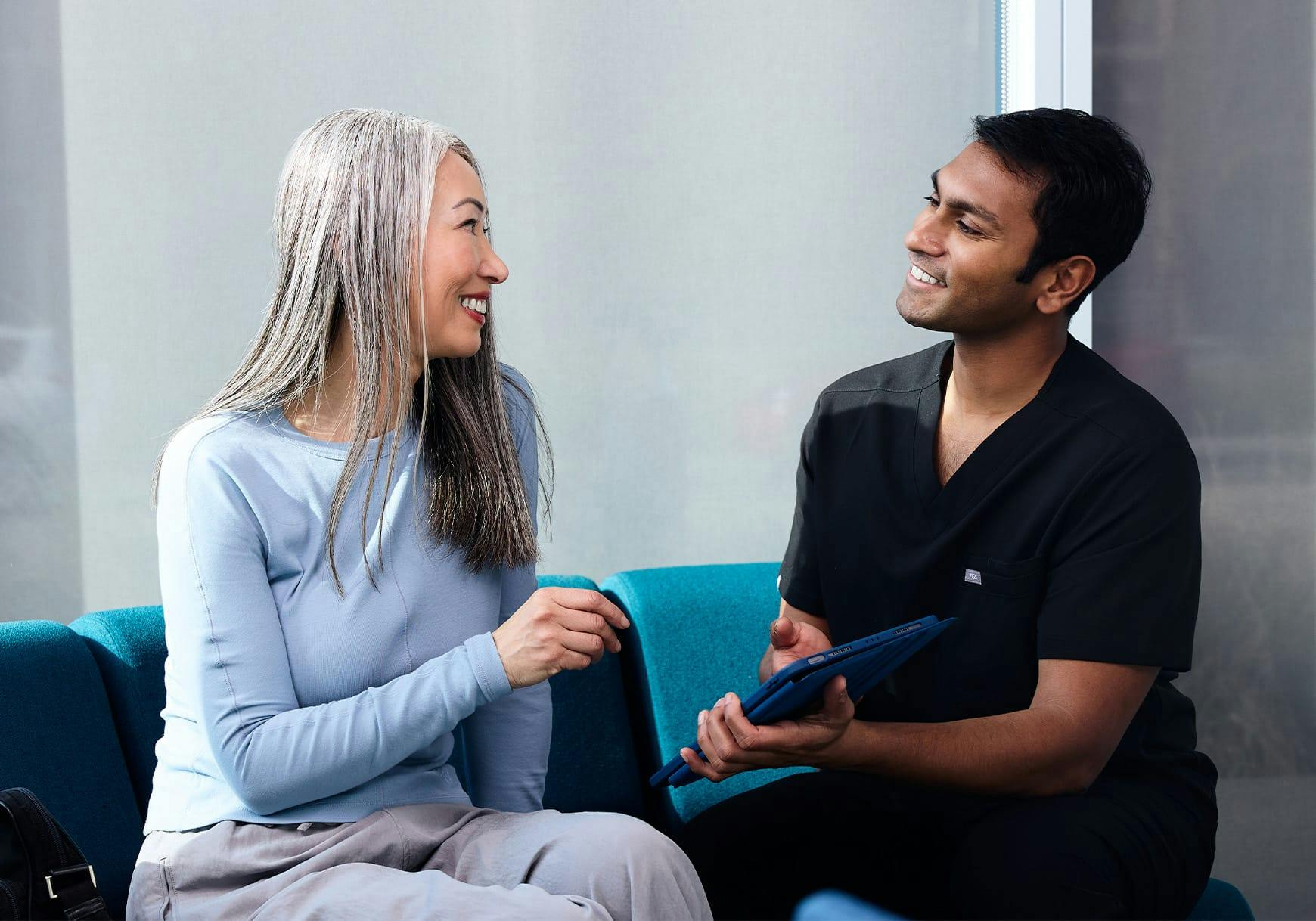 nurse talking to a patient
