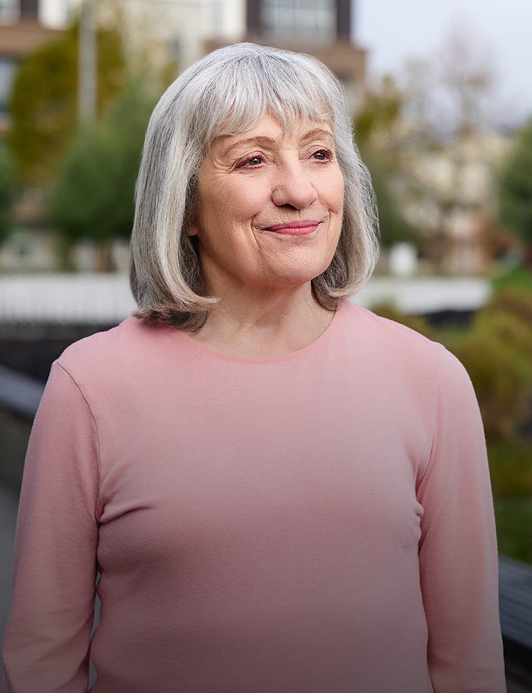 Woman in a pink sweater